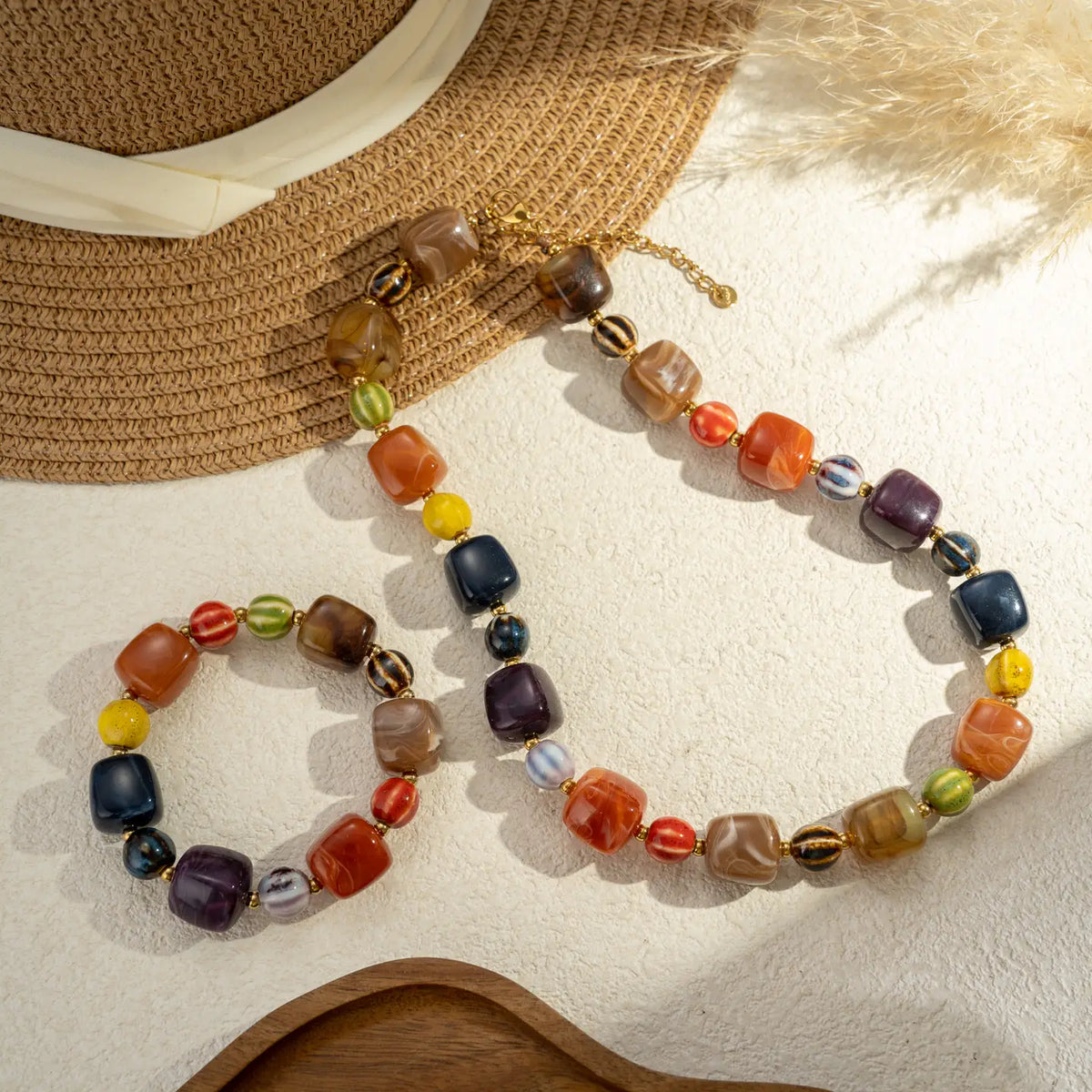Parure collier et bracelet en résine et céramique marbrée